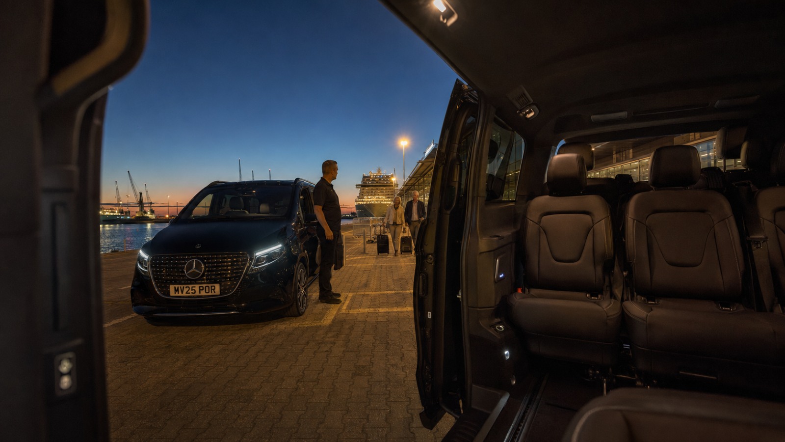 Black Mercedes V-Class MPV 8 Portsmouth to Gatwick taxi at the International Port cruise terminal for very early transfer.